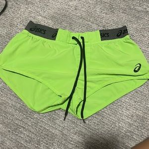 neon green shorts are asics XS